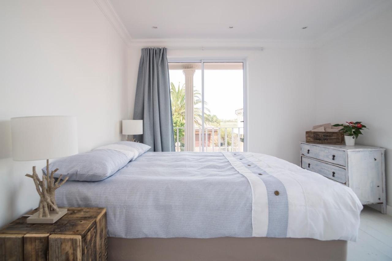 Sunset Beach Living Guesthouse Cape Town Bagian luar foto